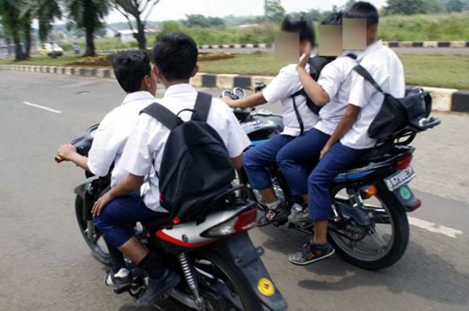 
 Ilustrasi siswa mengendarai sepeda motor ke sekolah. Foto: Istimewa